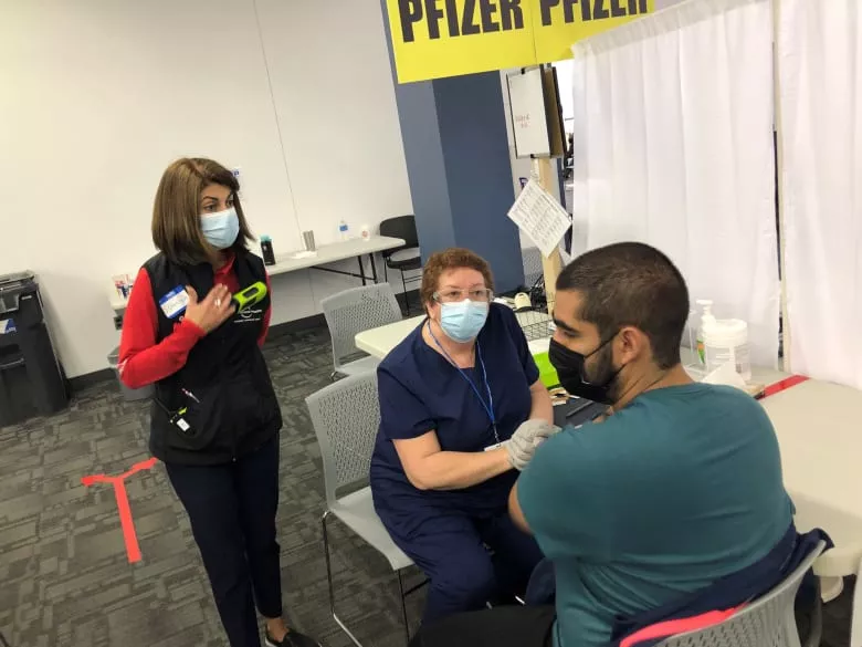 Spanish interpreter at first community vaccination program