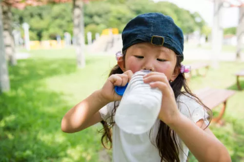 child drinking water