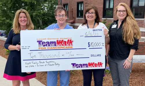 Michelle Ratty presenting grant check to TeamWalk for CancerCare Michelle Ratty presenting grant check to TeamWalk for CancerCare