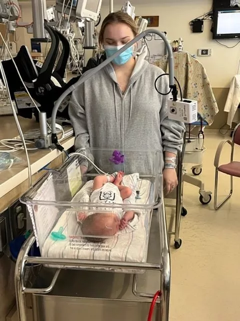 Krystyn Druin and her newborn twins monitored with AngelEye