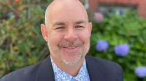 A man smiling.