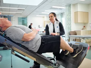 Physical Therapist, Andrea Sadler, working with patient on knee pain at the MelroseWakefield Hospital 888 Main rehabilitation office.