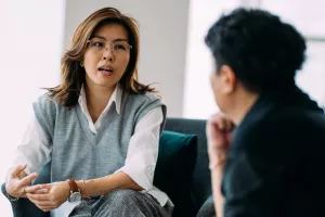 An psychologist and a patient delve into personal obstacles during an appointment.