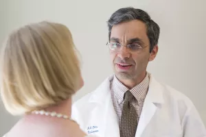 Anastassios Pittas, MD, MS, endocrinologist and Co-Director of the Diabetes Center at Tufts Medical Center consults with patient in clinic appointment. 