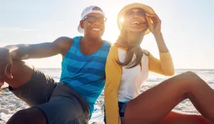 Two people enjoying the sun