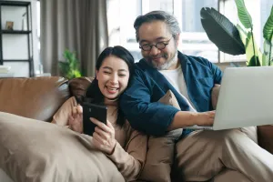Social Media - man & woman on their devices