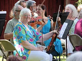 Elaine plays violin