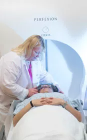 A patient receiving Gamma Knife treatment. A patient receiving Gamma Knife treatment.