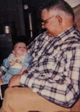 Albert holding his grandson Sean Albert holding his grandson Sean