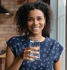 woman with glass of water