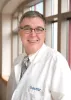 John E. Mignano